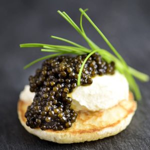 Caviar On Blinis