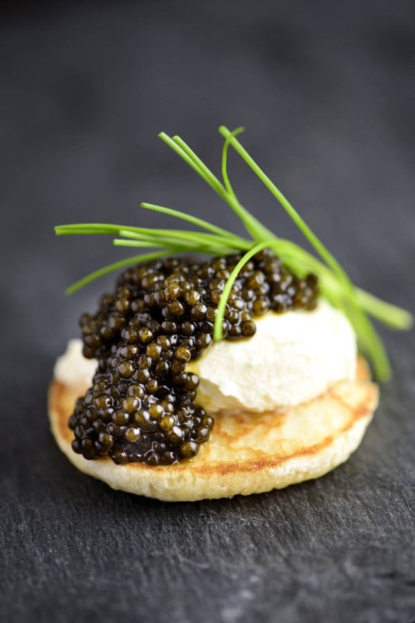 Caviar On Blinis